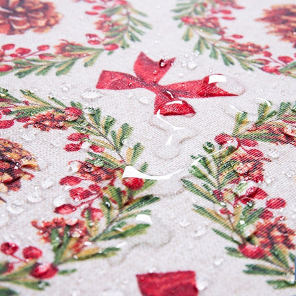 Rollo de mantel resinado antimanchas con lazos y piñas | Materiales: 75 % algodón y 25 % poliéster | Diseño navideño, fácil de limpiar