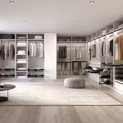 Wire basket wardrobe and soft-closing guide frame