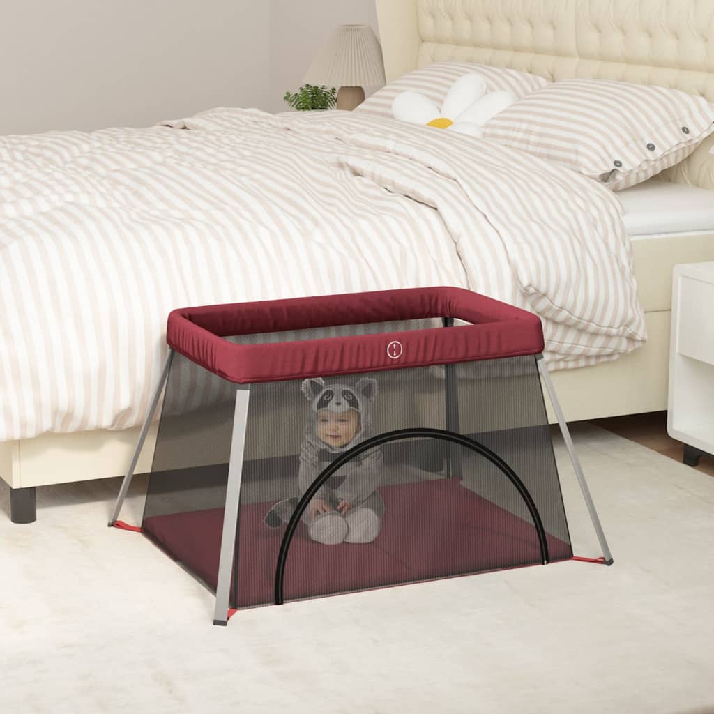 Baby playpen with red linen mattress