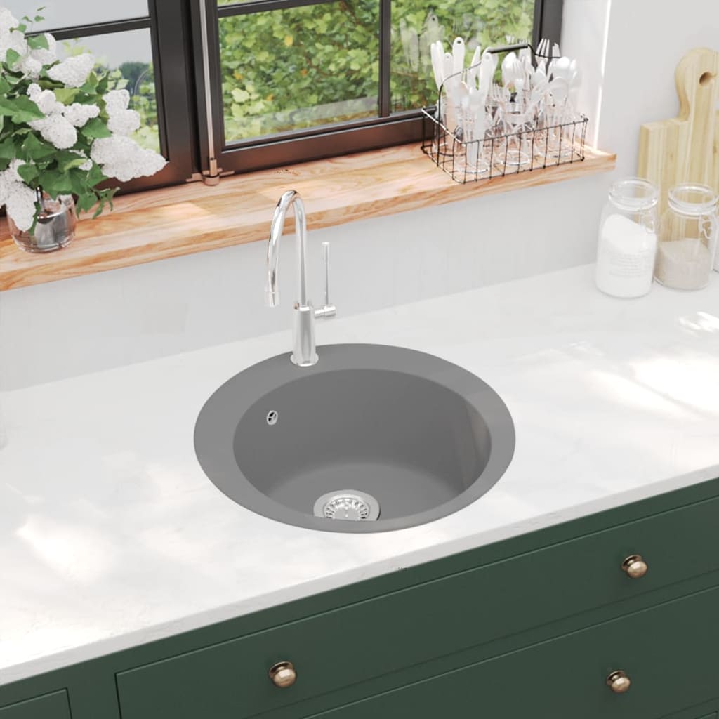 Granite kitchen sink with a round bowl 