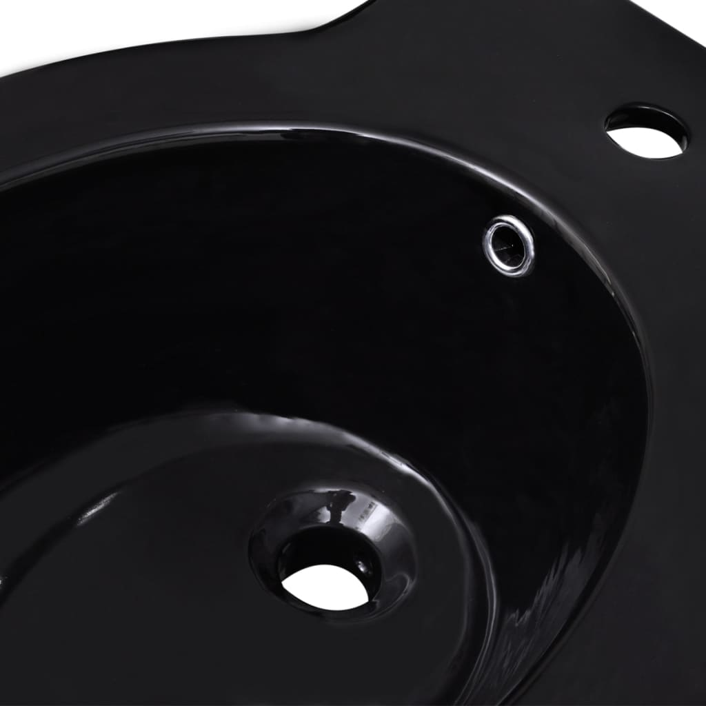 Black ceramic toilet and bidet