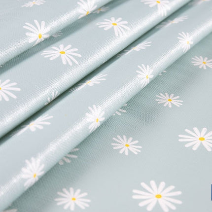 Rollo de hule estampado margarita jade | Materiales: PVC y tela no tejida de polipropileno | Fácil limpieza | Medidas 1,40 x 25 m